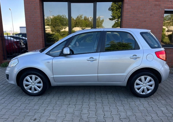 Suzuki SX4 cena 26900 przebieg: 153000, rok produkcji 2012 z Borne Sulinowo małe 254